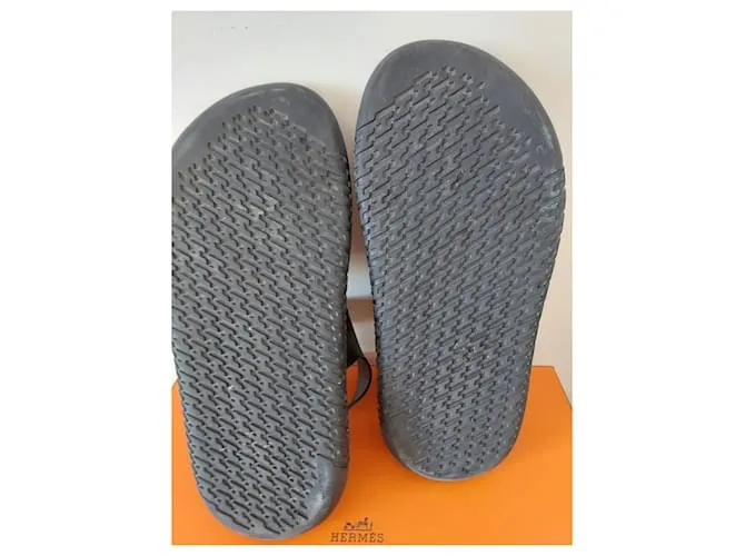 Archipiélago de las Sandalias de Hermès Negro Naranja 